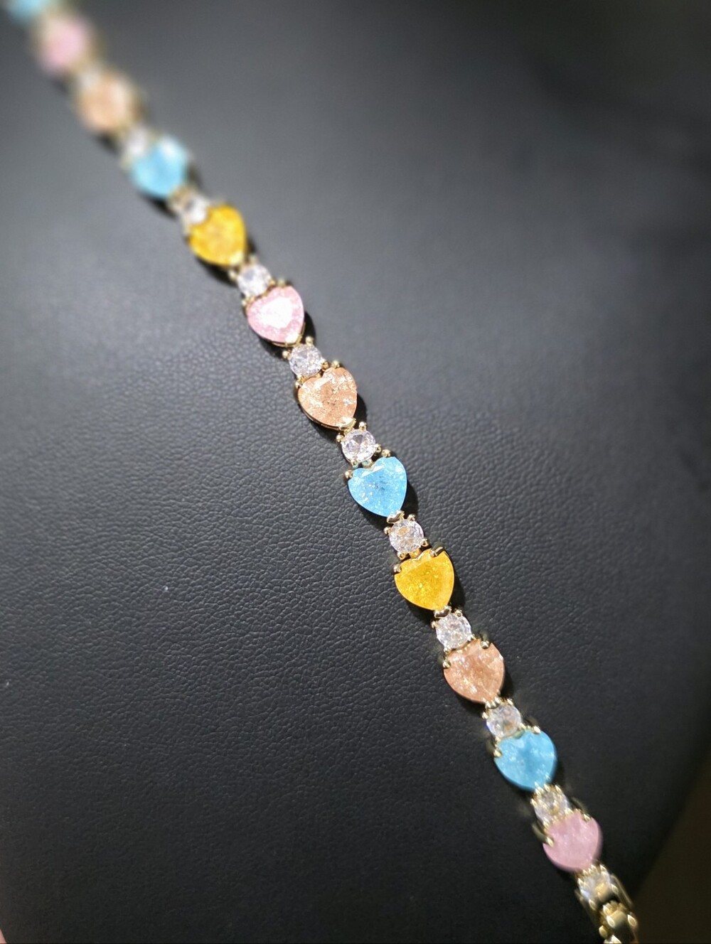 Gold-Tone Tennis Bracelet Featuring Alternating Pastel and Cubic Zirconia Stones